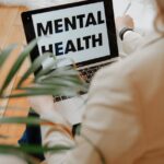 the words mental health on laptop screen