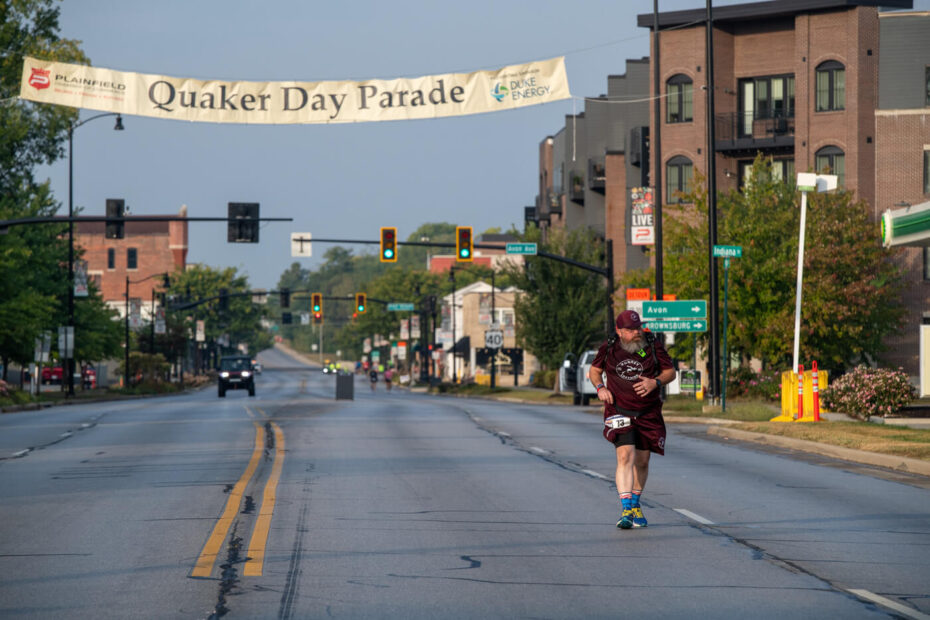 Runner participating in Quaker Day Parade event.